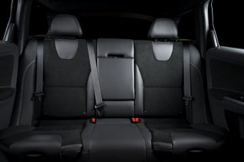 Back passenger seats in modern luxury car, black upholstery